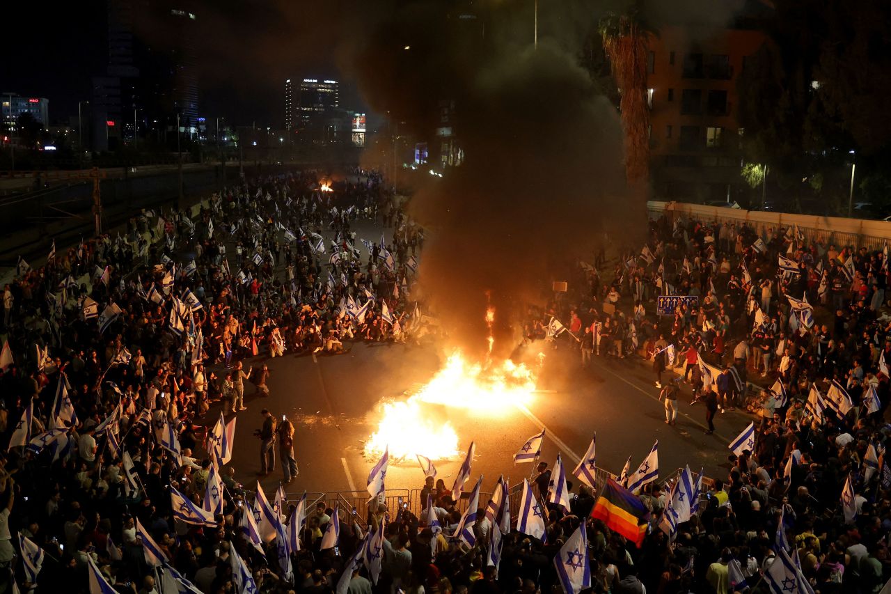 People attend a demonstration in Tel Aviv, Israel, on Sunday, March 26.