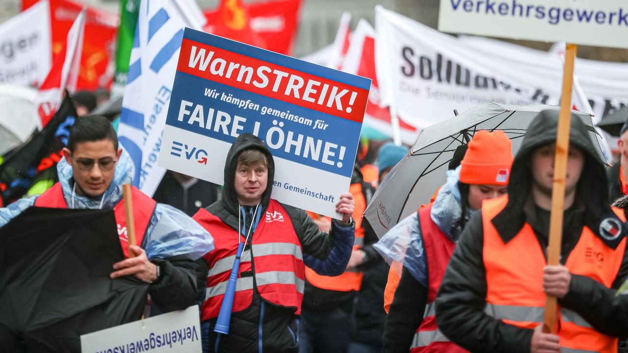 MUNICH, GERMANY - MARCH 27: Members of the Railway and Transport Union and of the United Service Union (ver.di) protest in Munich city centre during a nationwide strike on March 27, 2023 in Munich, Germany. Air travel and long distance rail service have mostly been shut down across Germany today. Labour unions representing over two million public sector employees are pushing for steep wage hikes due to the current high level of inflation.