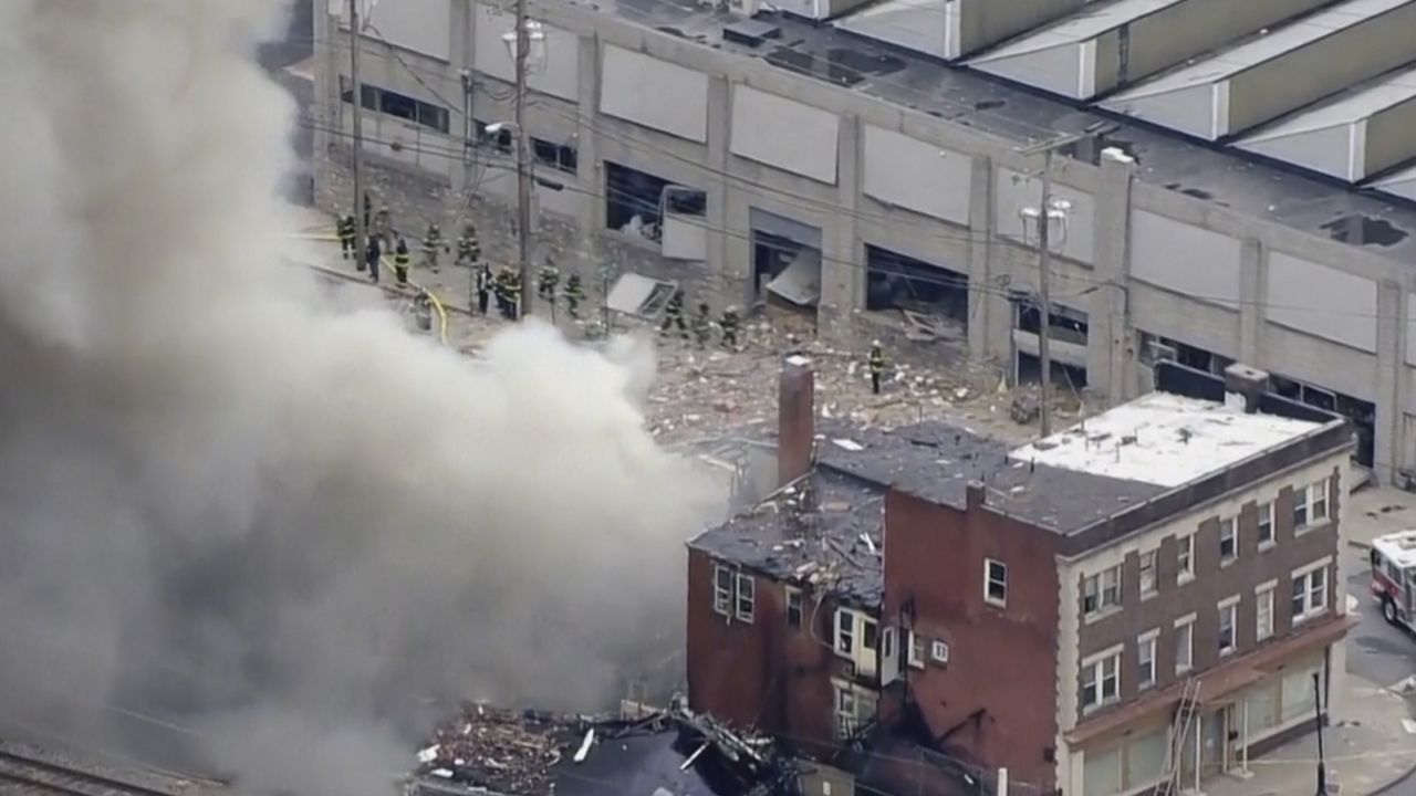 Smoke rises from an explosion at the R.M. Palmer Co. facility on March 24, 2023. 