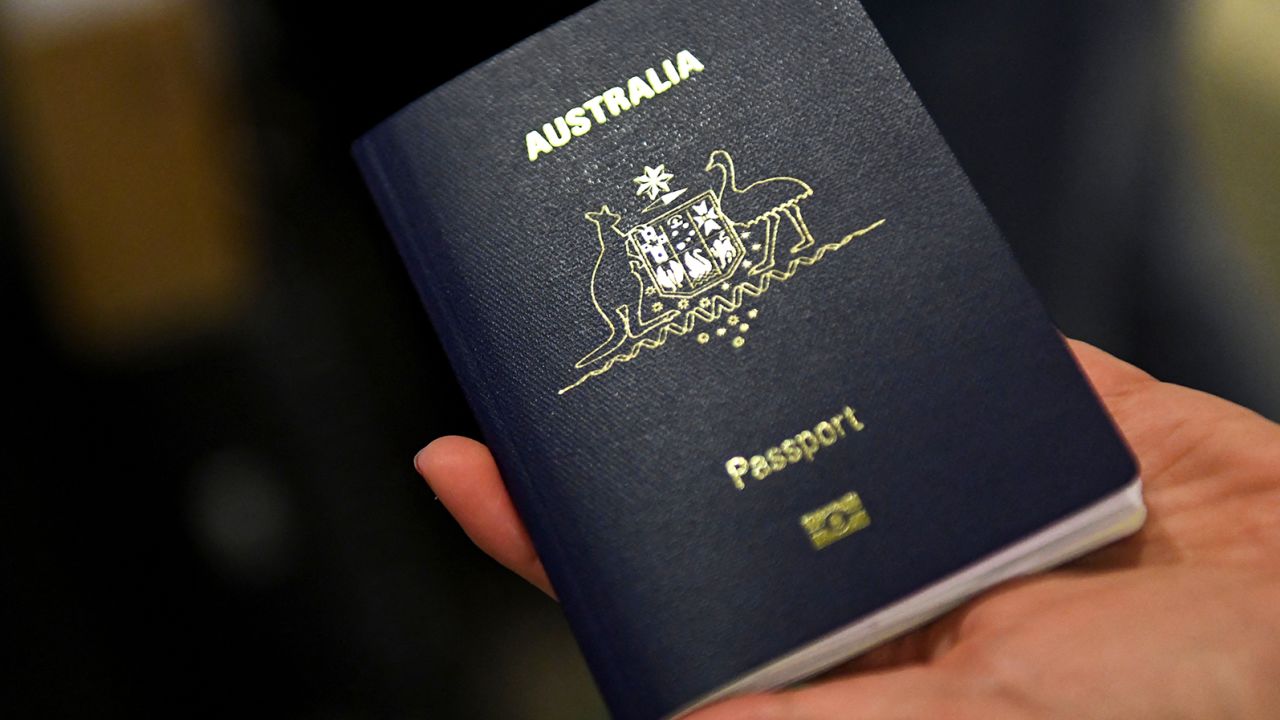 An Australian passport is displayed. Nearly 8 million passport numbers were stolen in a large-scale information theft from Latitude Holdings.
