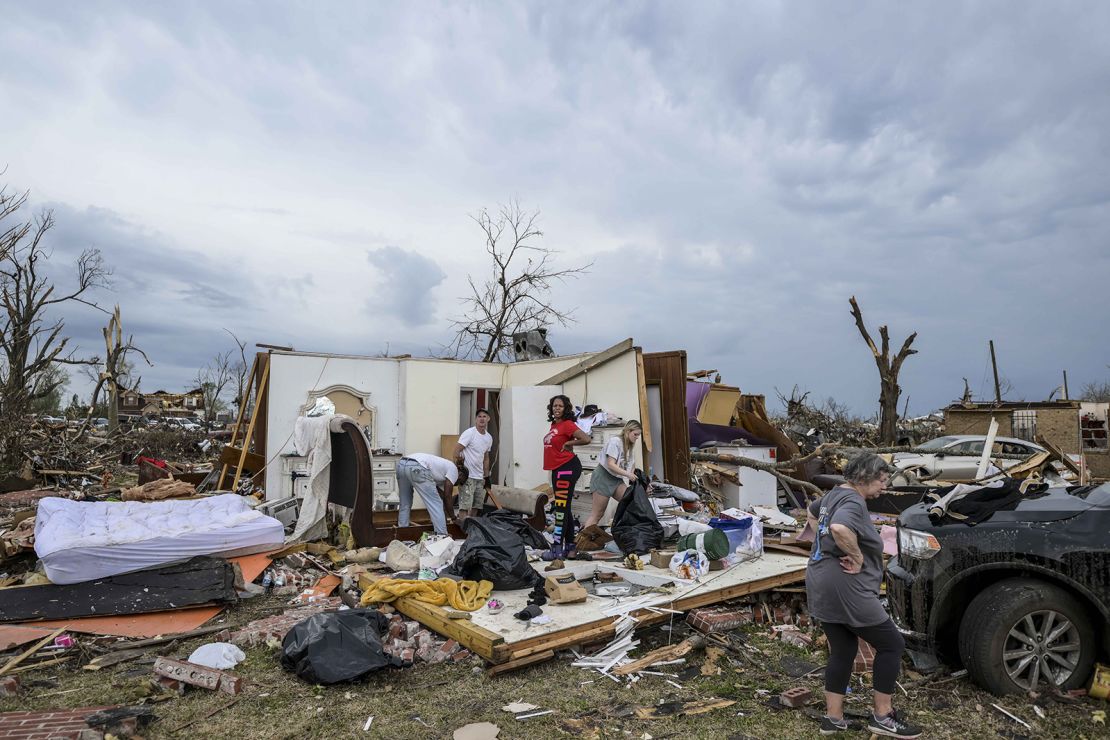 Residents survey the damage Sunay in Rolling Fork, Mississippi.