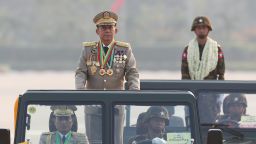 Senior Gen. Min Aung Hlaing, left, head of the military council, inspects officers during a parade to commemorate Myanmar's 78th Armed Forces Day in Naypyitaw, Myanmar, Monday, March 27, 2023. 