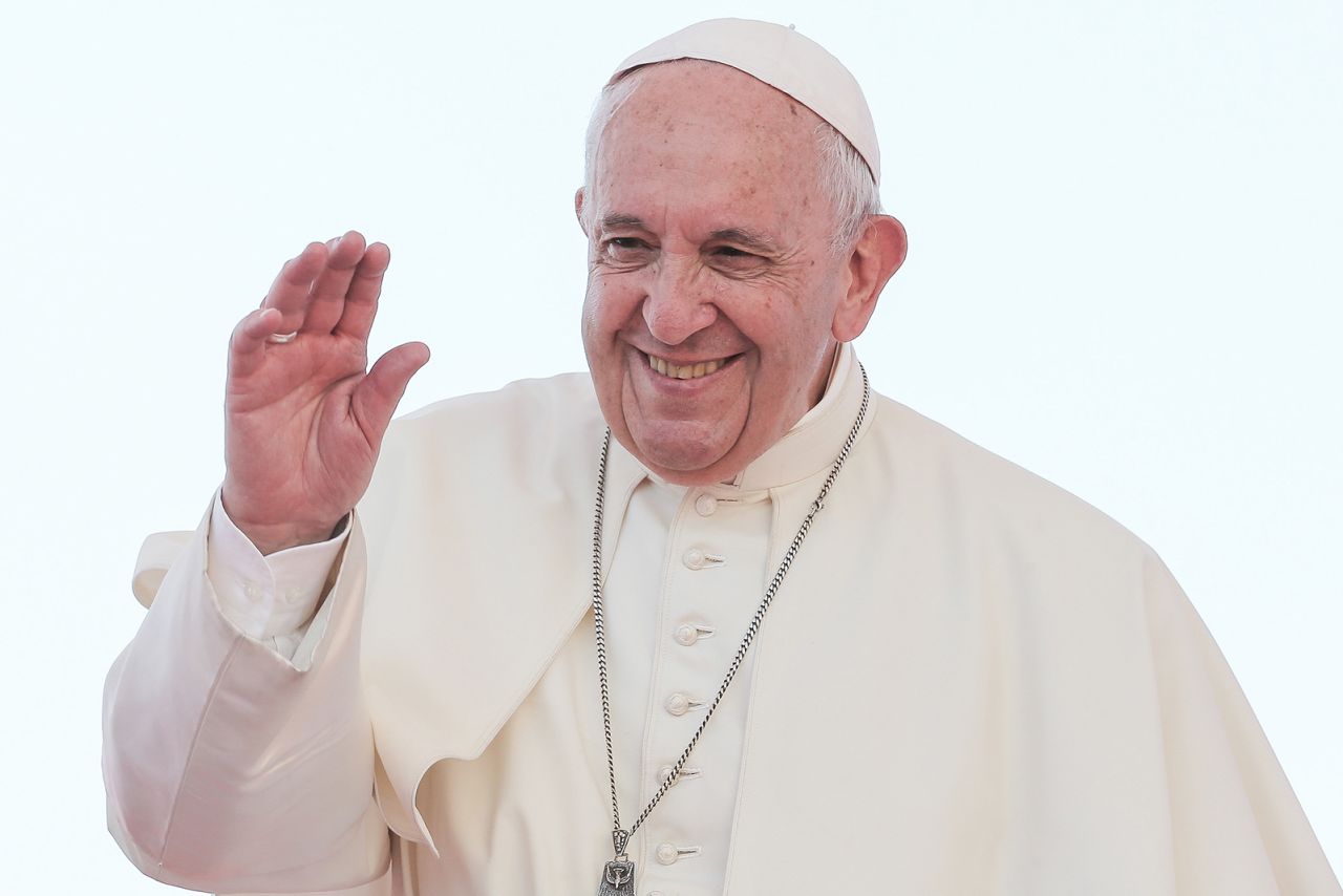 Pope Francis greets the faithful during the Veritas Gaudium conference in Naples.