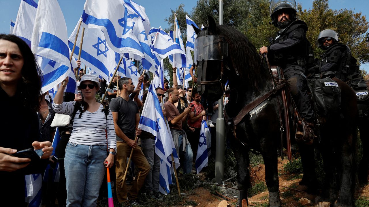 Protesters pictured in Jerusalem on Monday.