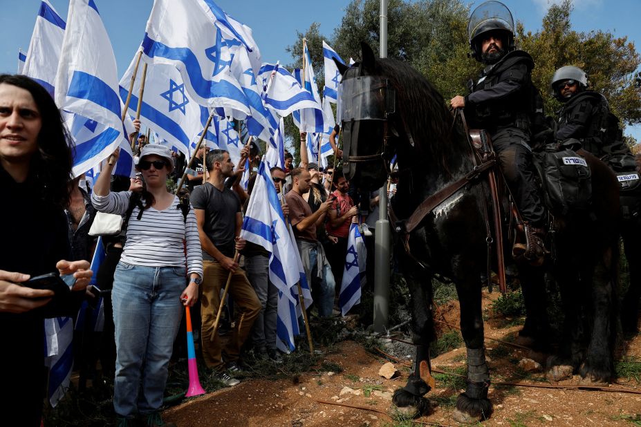 People attend a demonstration in Jerusalem on March 27.