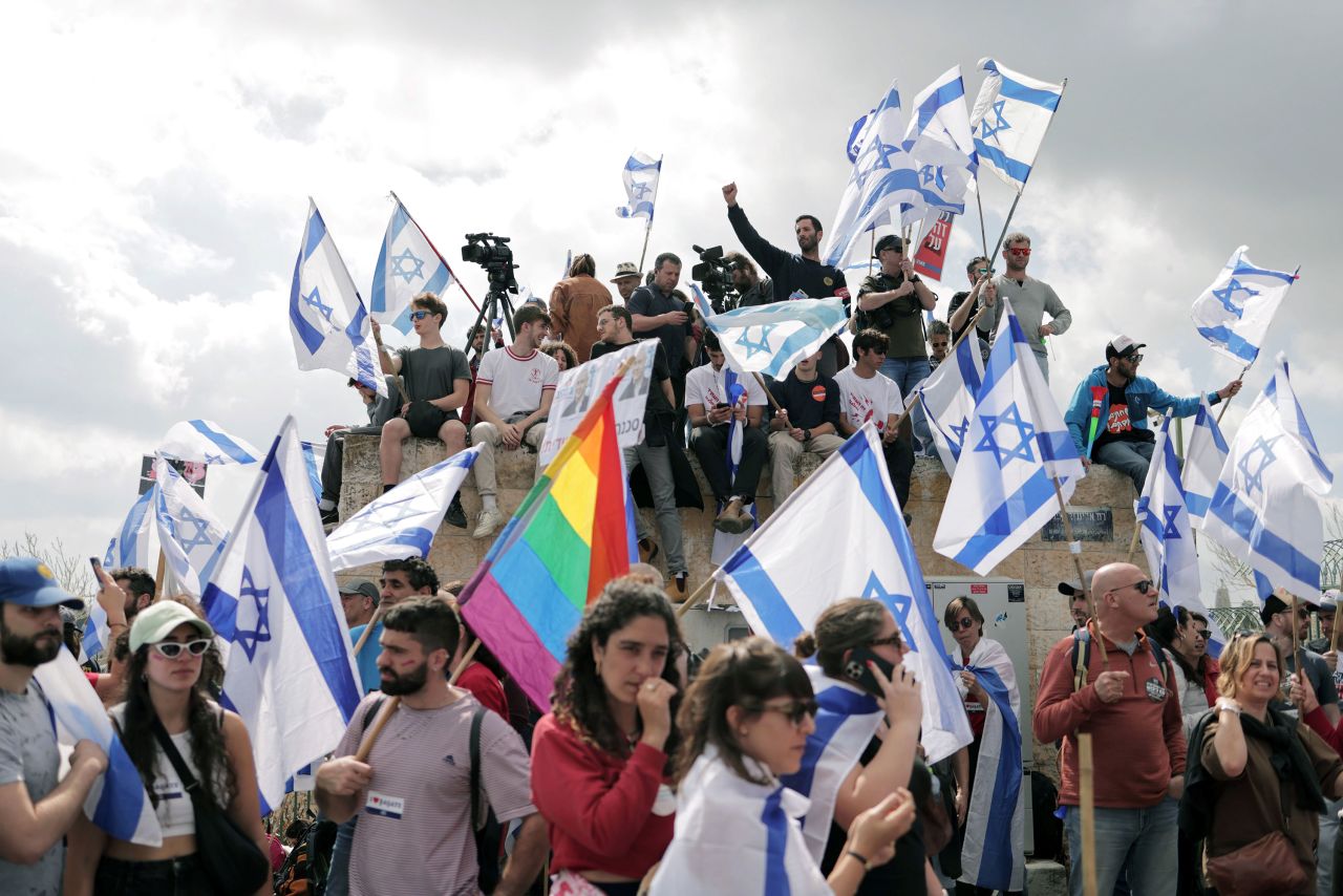 Protesters gather outside the Knesset on March 27.