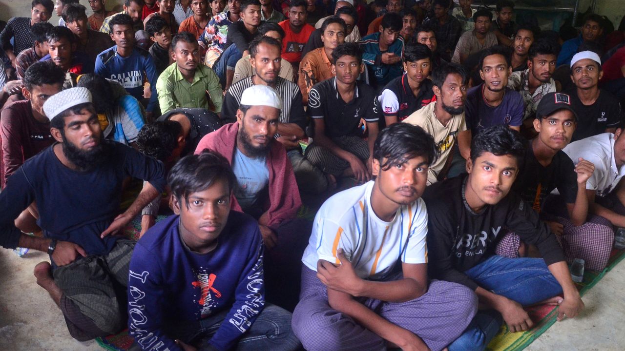 Rohingya refugees sit inside a temporary shelter after they landed in Kuala Matang Peulawi,  Aceh province, Indonesia, on March 27.
