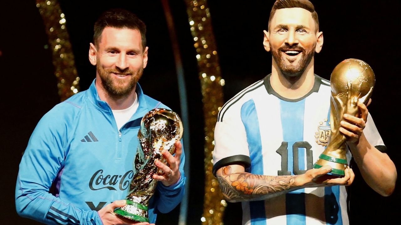 Soccer Football - Copa Libertadores - Draw - Conmebol headquarters, Luque, Paraguay - March 27, 2023
Argentina's Lionel Messi poses with a statue of himself holding the World Cup during the Conmebol event. 