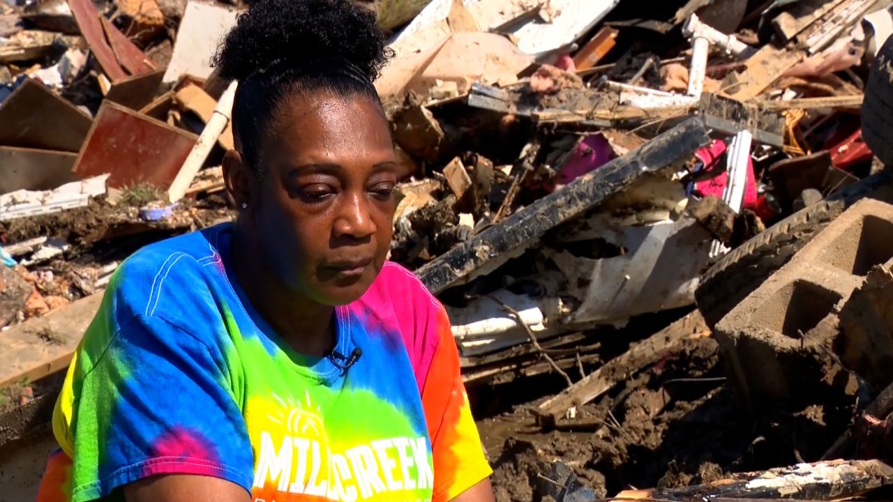 JoAnn Winston is pictured among the debris after a tornado struck Silver City, Mississippi. 