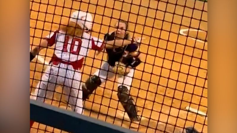 Video: Softball catcher falls for ‘the oldest trick in the book’ | CNN