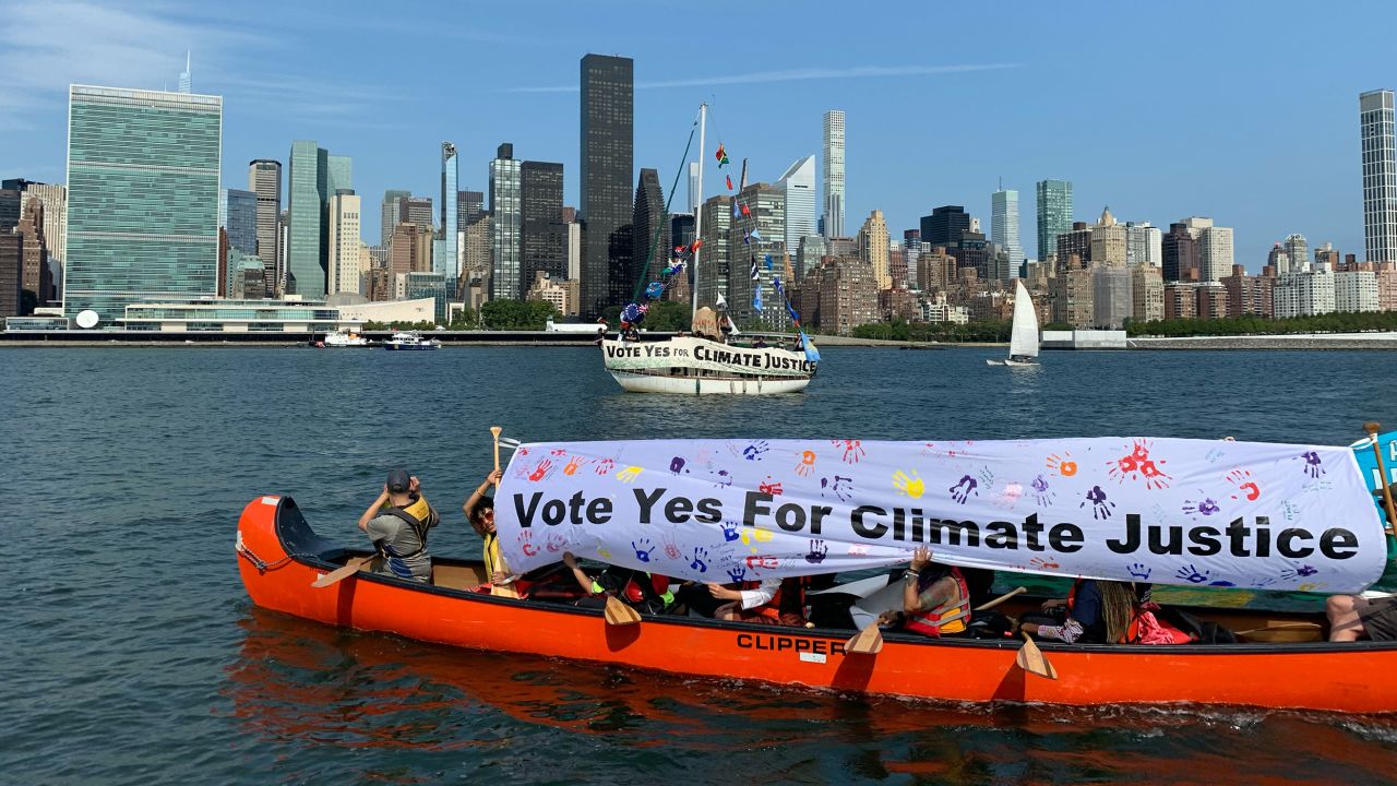 Pacific islander activists rallying in boats in front of the UN headquarters in New York City during the 2022 UN Climate Week.