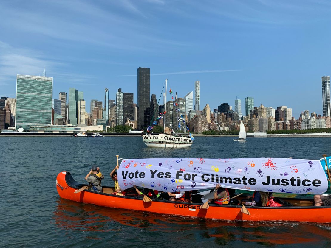 Pacific islander activists rallying in boats in front of the UN headquarters in New York City during the 2022 UN Climate Week.