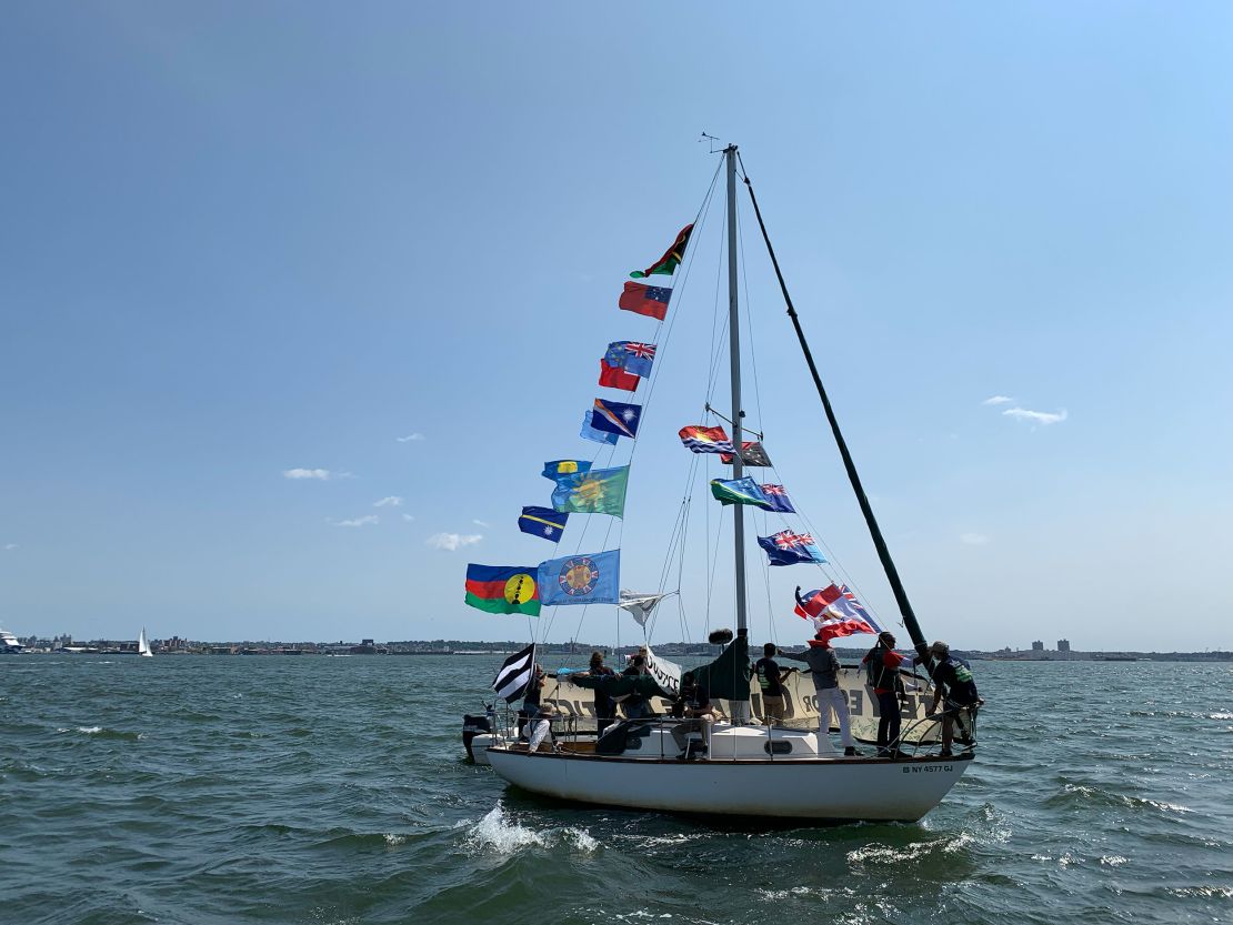 Pacific islander activists rallying in boats in front of the UN headquarters in New York during UN Climate Week in 2022.
