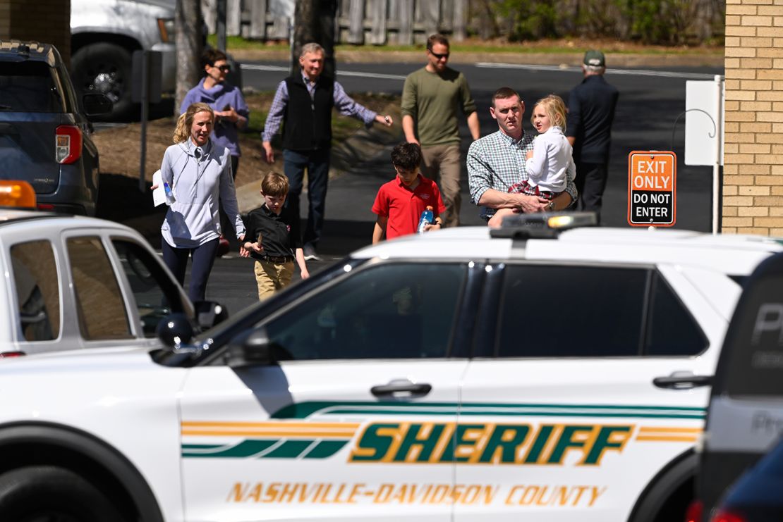 Families leave a reunification site in Nashville on Monday following the deadly school shooting.