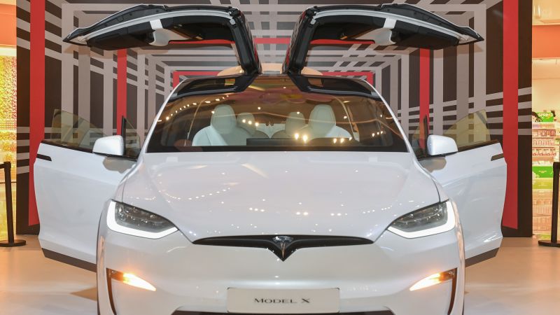 Read more about the article Tesla under investigation again from safety regulators this time for seatbelt attachments – CNN