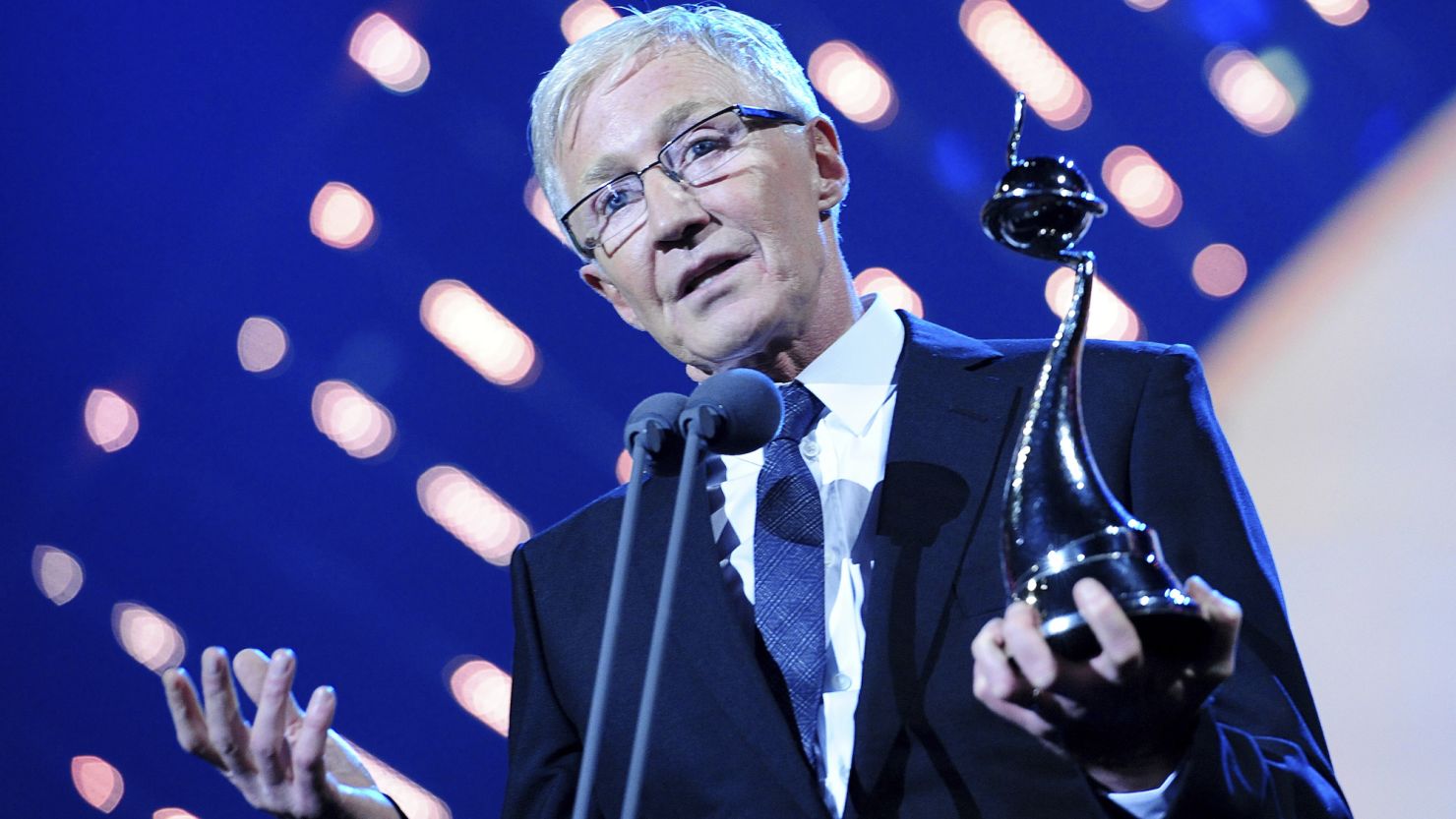 Paul O'Grady died "unexpectedly but peacefully" on March 28, his husband said.