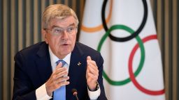 International Olympic Committee (IOC) President Thomas Bach gestures during an IOC executive board meeting where the issue of Russian athletes will be discussed, in Lausanne, on March 28, 2023. - Poland, Ukraine and the Baltic states reiterated on March 27, 2023 their call to maintain the ban on Russian and Belarusian athletes at the Olympics, saying "not a single reason" existed to lift the restrictions. 