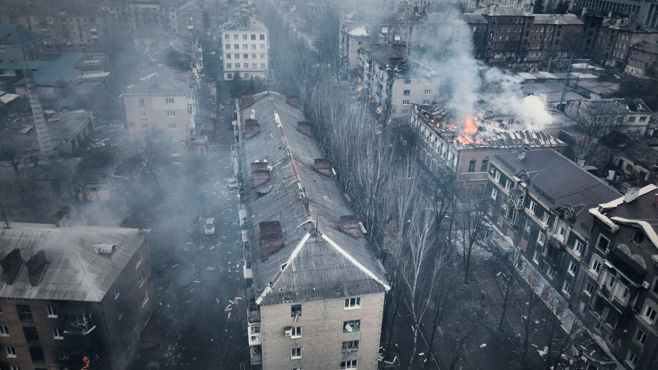 Smoke rises from burning buildings in an aerial view of Bakhmut, the site of heavy battles with Russian troops in the Donetsk region, Ukraine, Sunday, March 26, 2023.