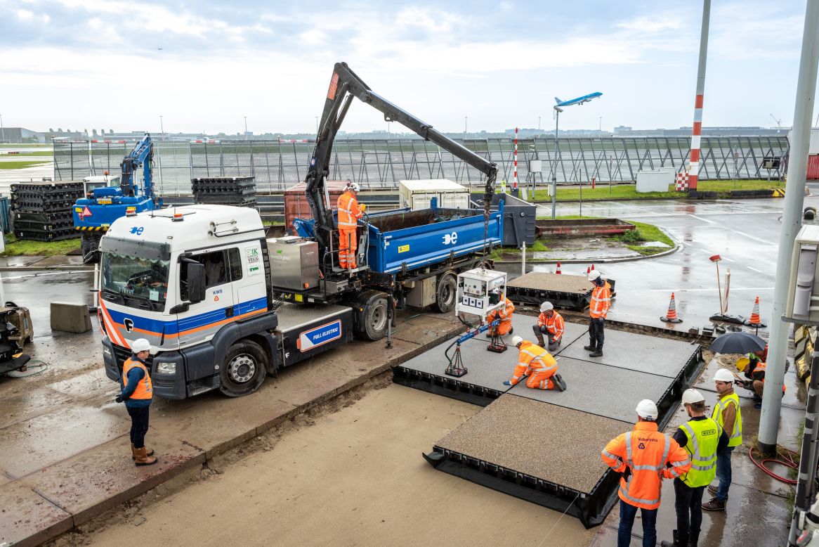 Hollow channels in PlasticRoad's pavers can hold water, pipes, and wires, and make the blocks light enough to be laid directly on sand beds. Their portability allows them to be moved or replaced as the needs of a city and its population change.