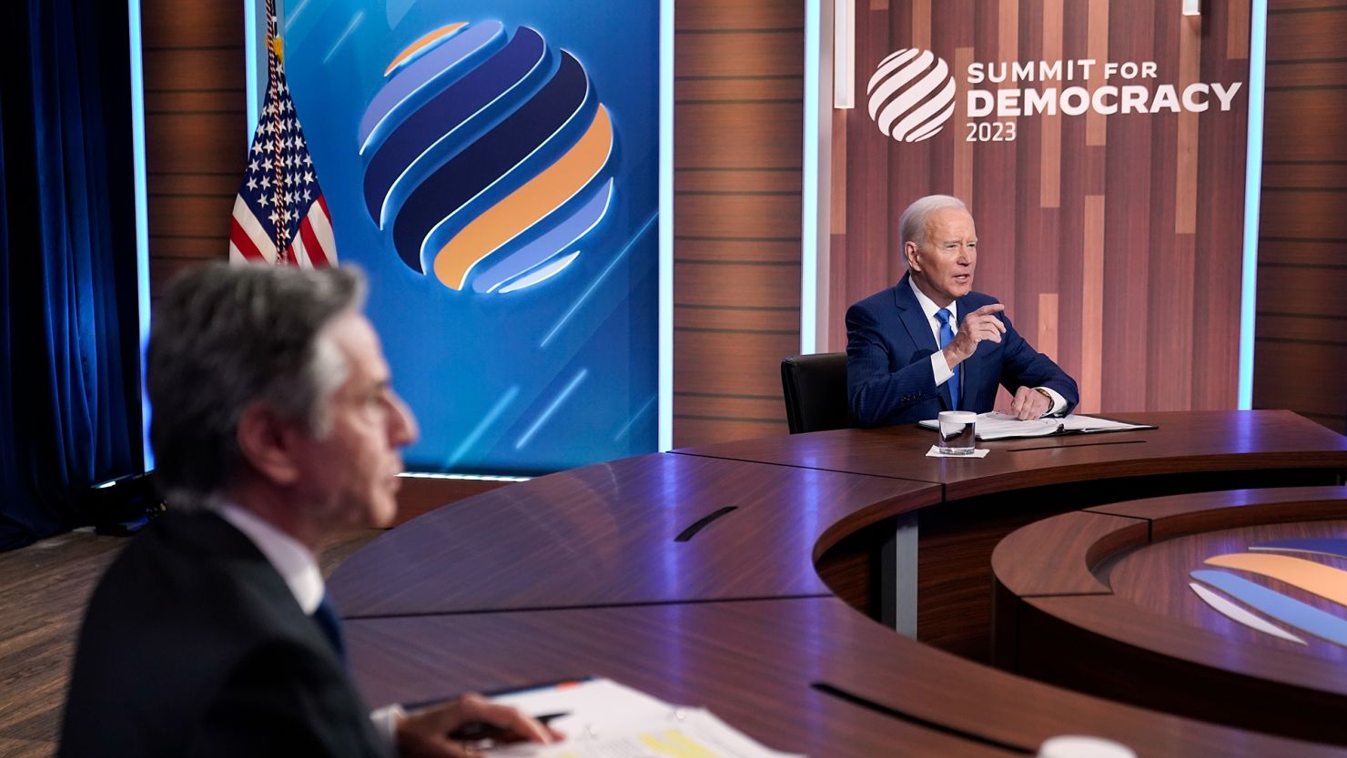 President Joe Biden speaks alongside Secretary of State Antony Blinken during a Summit for Democracy virtual plenary in the South Court Auditorium on the White House campus, Wednesday, March 29, 2023, in Washington, DC.