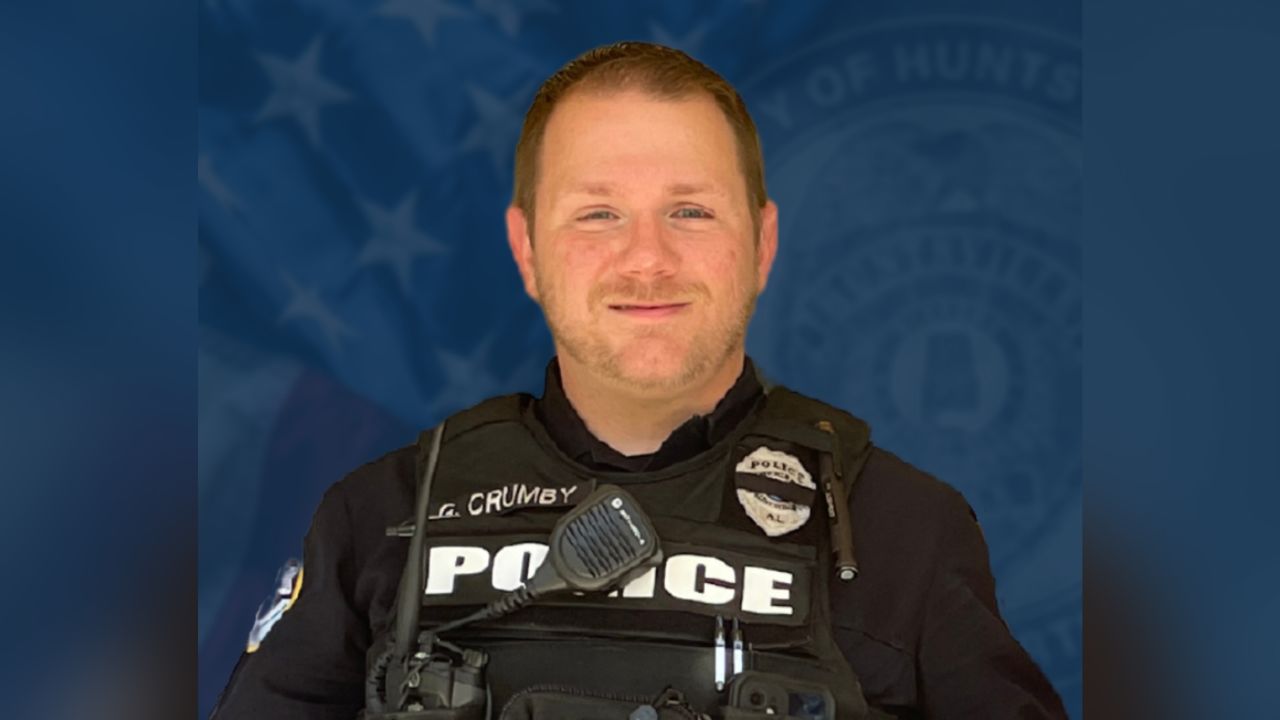 Officer Garrett Crumby died after being shot by the suspect.