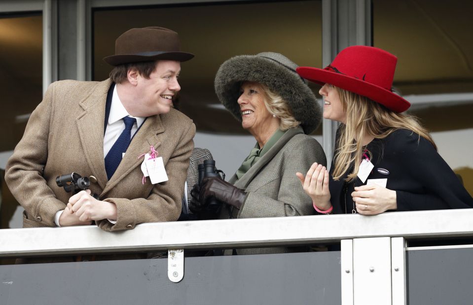 Camilla and her children, Tom and Laura, watch horse races at the Cheltenham Festival in March 2015.
