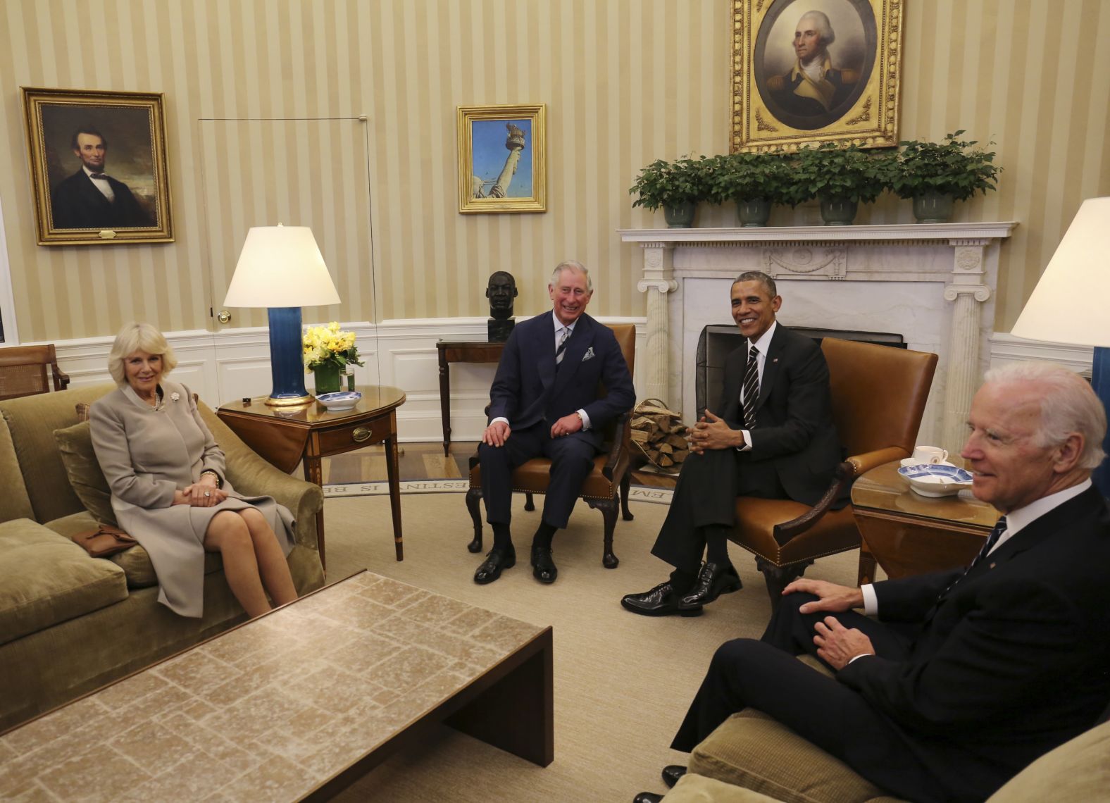 Camilla and Charles sit in the White House Oval Office with US President Barack Obama and Vice President Joe Biden during a trip to the United States in March 2015.