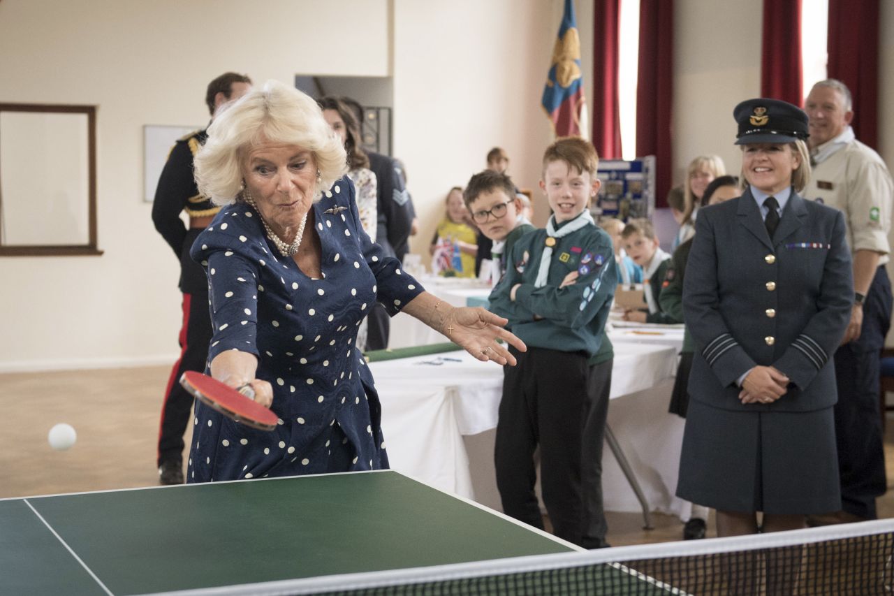 Camilla plays table tennis while visiting the Royal Air Force Halton in Aylesbury, England, in July 2019. It was part of the air station's centenary year celebrations.