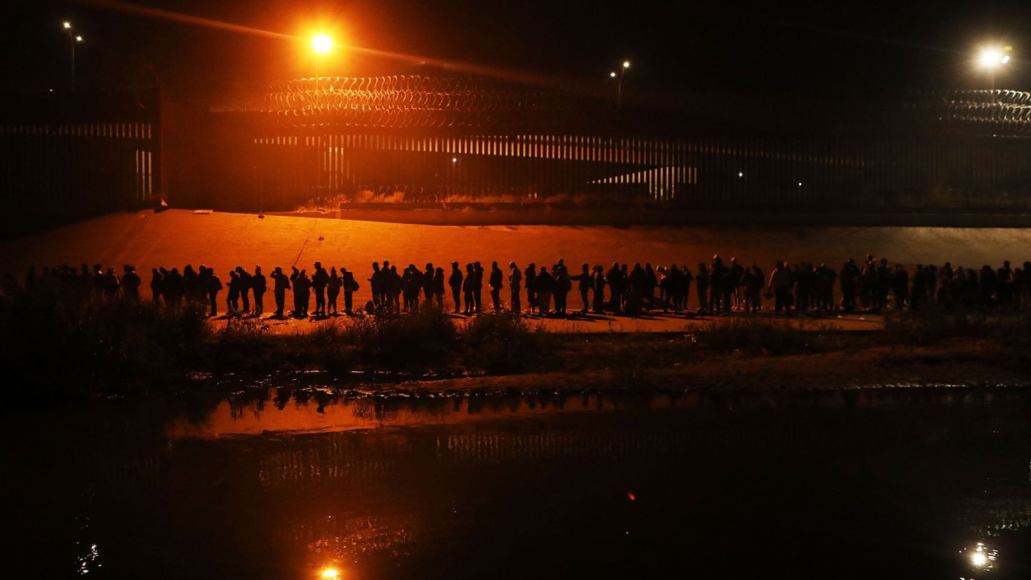 Migrants traveling in a caravan of more than a thousand people from countries such as Nicaragua, Peru, Ecuador, Colombia, Venezuela and the Dominican Republic cross the Rio Grande to ask for political asylum in the United States, in Ciudad Juarez, Chihuahua state, Mexico, on December 11, 2022. 