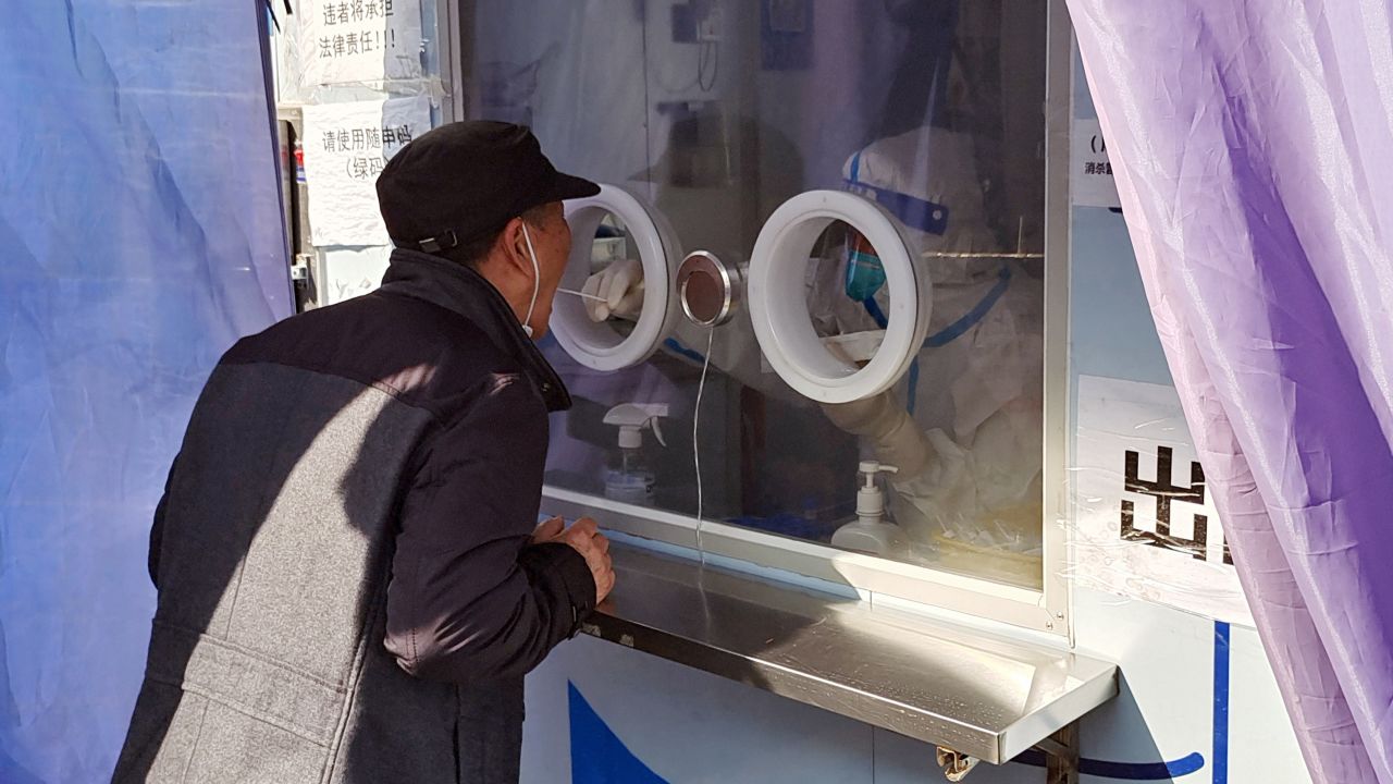 A man undergoes a Covid test in Shanghai on January 7, 2023. China's government is strapped for cash after years of enforcing its costly zero-Covid policy.