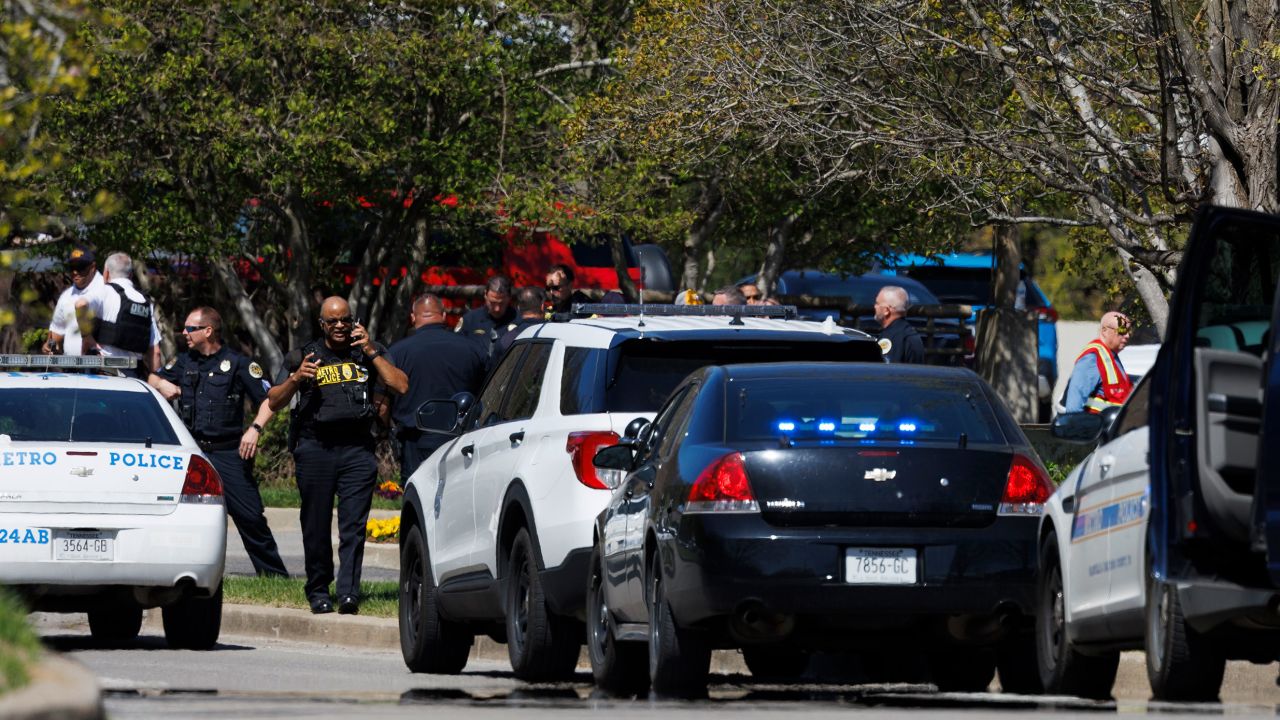  Police work near the scene of the mass shooting at The Covenant School in Nashville on Monday.