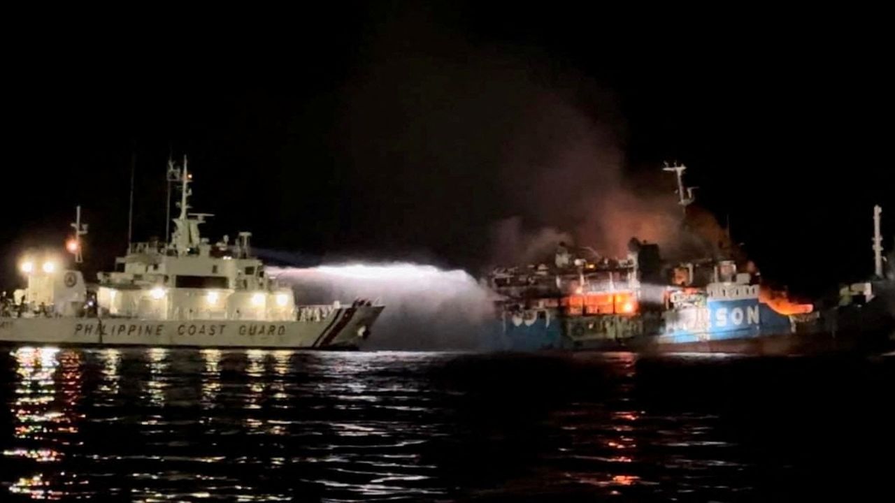 The Philippine Coast Guard responds to the fire aboard a passenger ferry  in waters off Baluk-Baluk Island, Hadji Muhtamad, Basilan, Philippines, March 29, 2023.