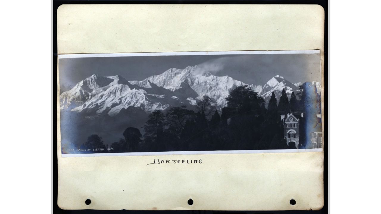 Here's a stunning photograph of Darjeeling, India, pasted into Eleanor Phelps' scrapbook.