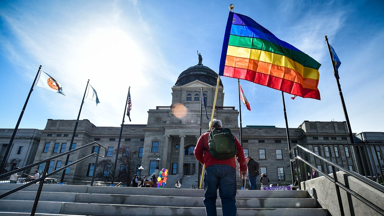Demonstrators gather on the steps of the Montana State Capitol protesting anti-LGBTQ legislation on March 15, 2021, in Helena.