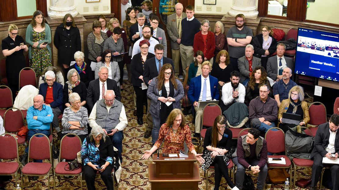 Opponents of SB99, a bill banning gender-affirming medical care for transgender minors, line up out the door of the Senate Judiciary Committee on January 27 in the State Capitol in Helena, Montana.