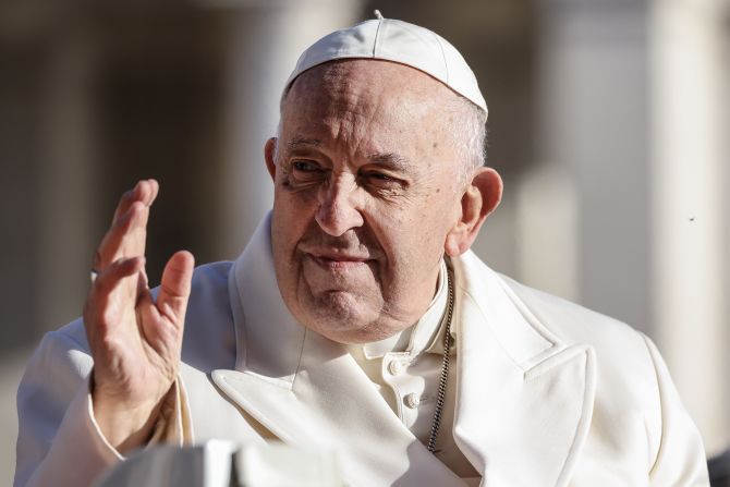 Pope Francis waves as he arrives at St. Peter's Square in the Vatican in March 2023.