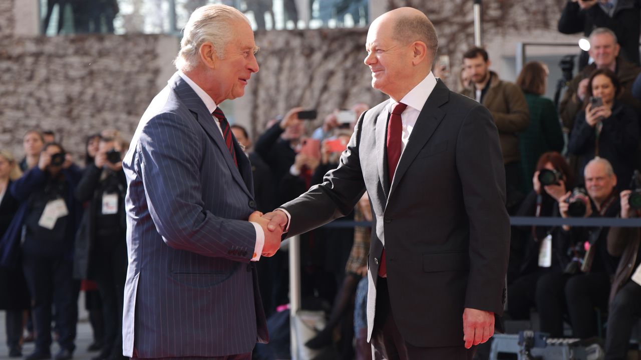 King Charles III is welcomed by German Chancellor Olaf Scholz at the Chancellery on Thursday in Berlin, Germany.