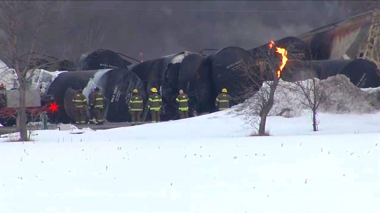 First responders work the scene of a train derailment Thursday in Raymond, Minnesota.