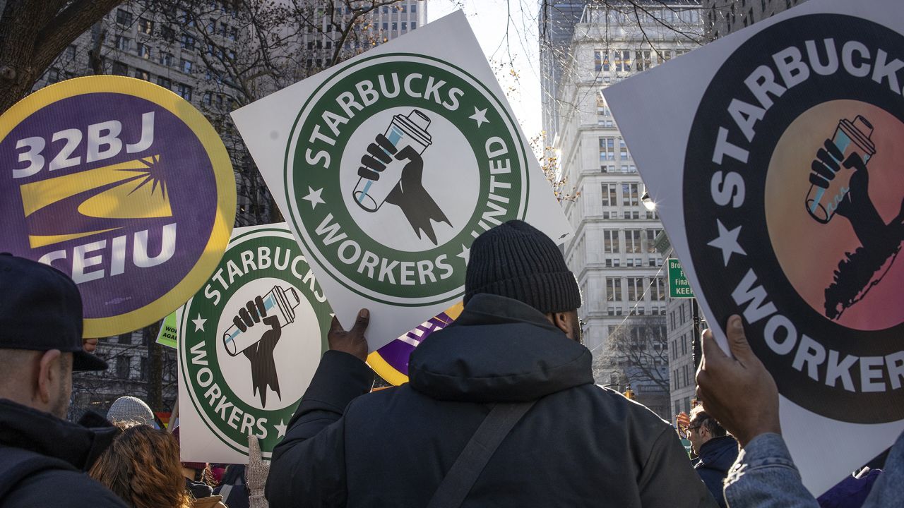 Starbucks workers rally in celebration of the first anniversary of the union's founding on December 9, 2022 in New York City.