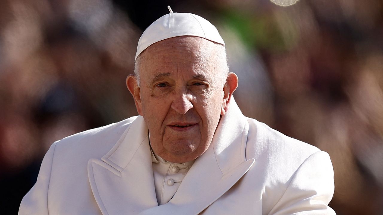 The health of Pope Francis, pictured in St. Peter's Square on March 29, 2023, is "improving" after he was hospitalized earlier this week, the Vatican said. 