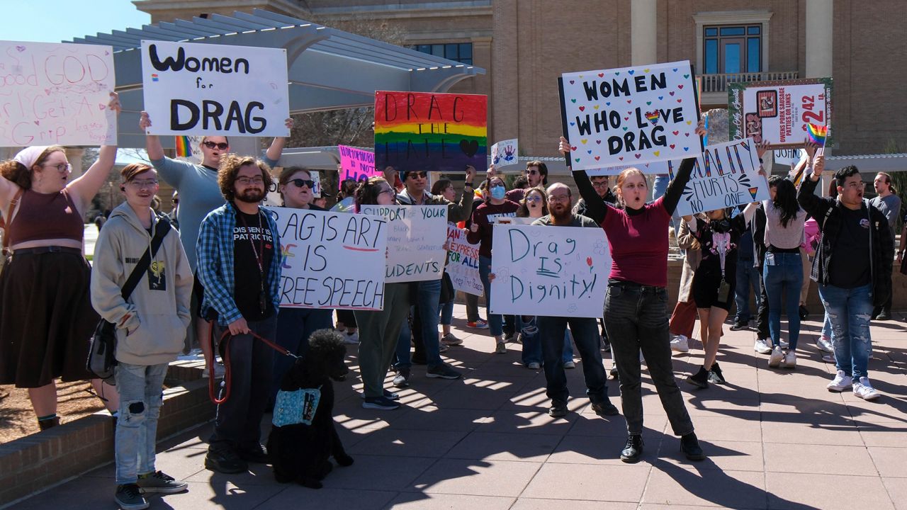 Dozens gather March 21, 2023, at West Texas A&M University to protest the president's decision to cancel the student drag show.