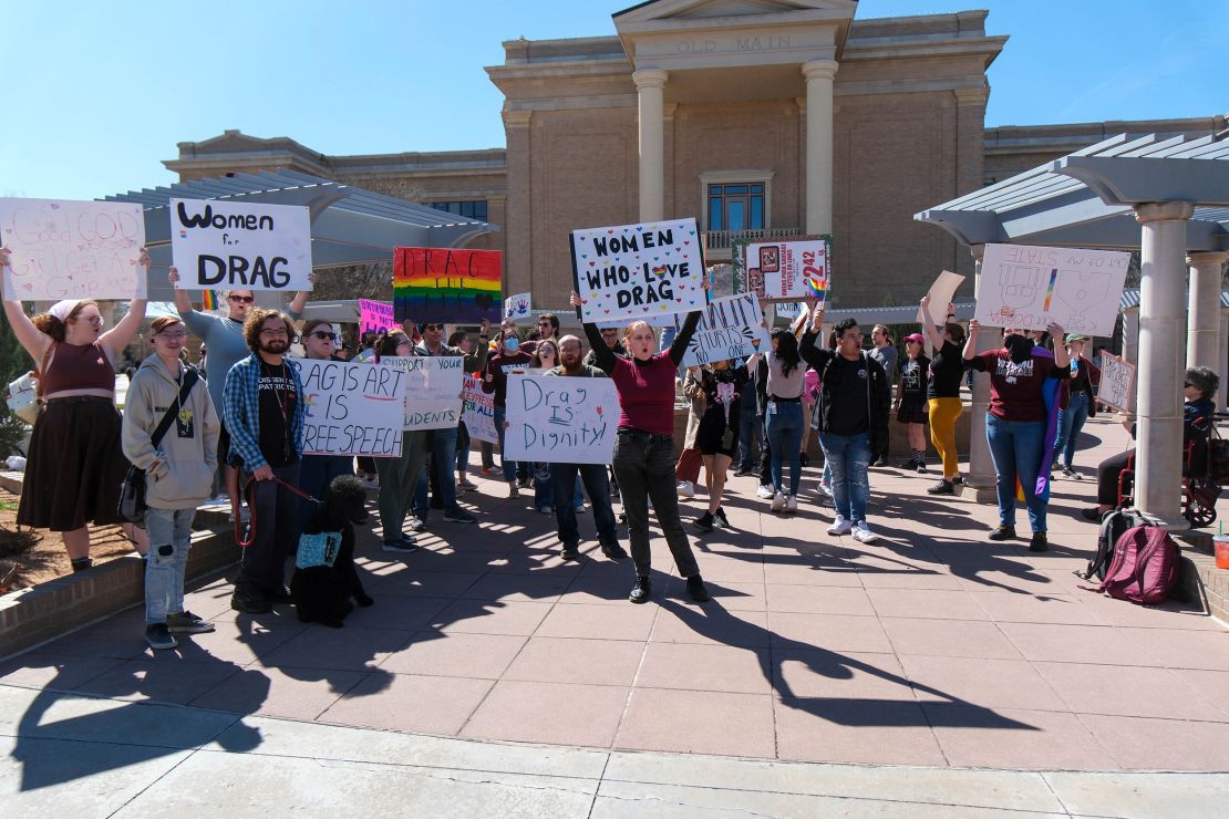 Dozens gather March 21, 2023, at West Texas A&M University to protest the president's decision to cancel the student drag show.