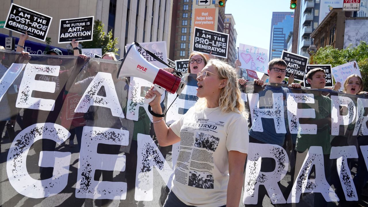 Anti-abortion activists march through downtown Columbus during the first Ohio March for Life on October 5, 2022. 