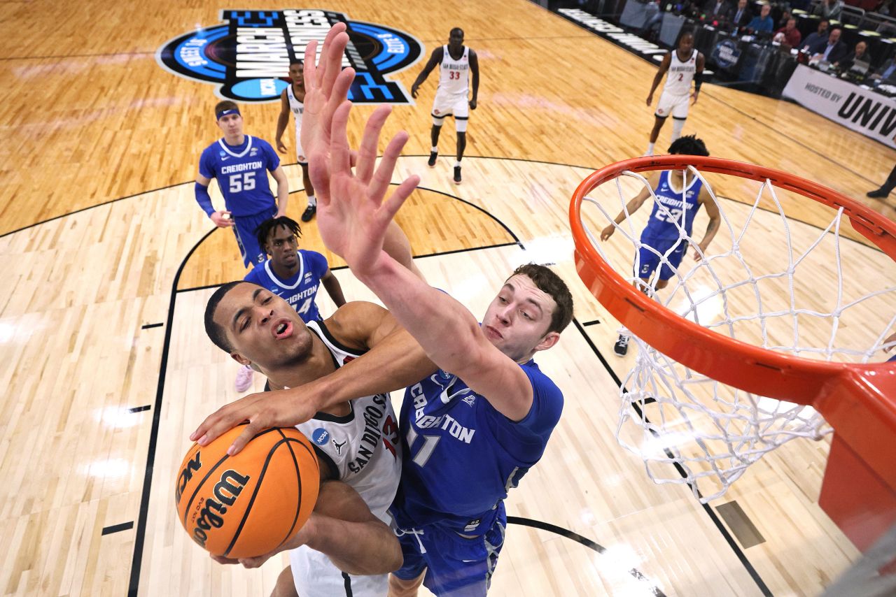 San Diego State's Jaedon LeDee is defended by Creighton's Ryan Kalkbrenner during an NCAA Tournament game on Sunday, March 26. San Diego State won 57-56 to advance to its<a href="https://www.cnn.com/2023/03/26/sport/ncaa-tournament-final-four-san-diego-miami/index.html" target="_blank"> first Final Four in school history</a>.