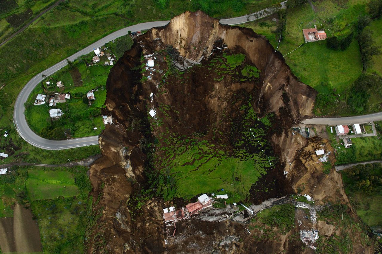 This aerial photo, taken on Tuesday, March 28, shows an area affected by a landslide in Alausi, Ecuador. The deadly landslide was triggered by months of heavy rain.