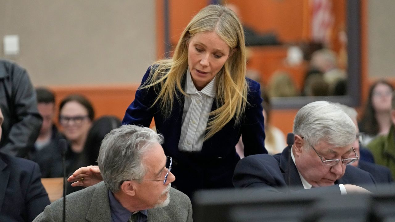 Gwyneth Paltrow speaks with Terry Sanderson, left, as she walks out of the courtroom following the reading of the verdict in their lawsuit trial, Thursday, March 30, 2023, in Park City, Utah.