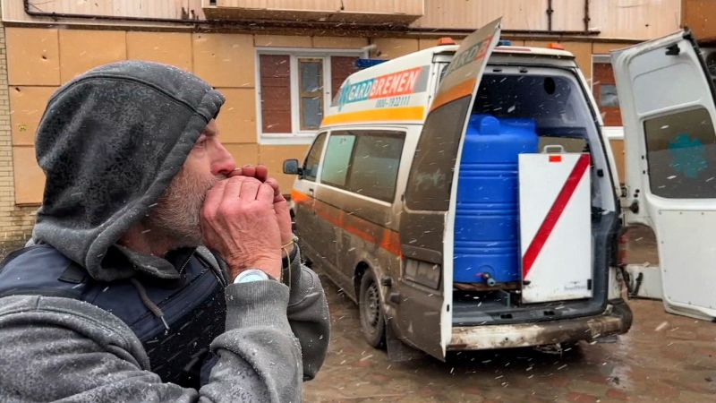 NextImg:Video: Volunteers provide lifeline to civilians on Ukrainian front line by delivering water | CNN