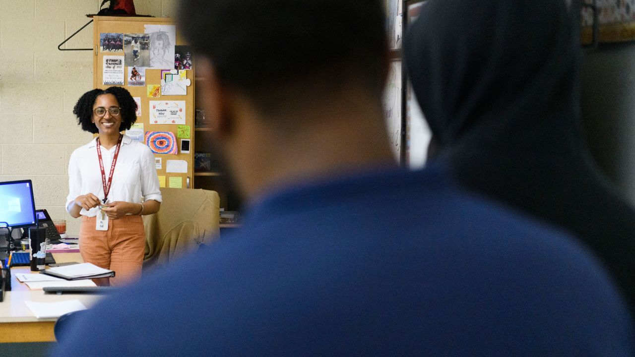Shekinah Hall reviews a student's presentation on Black change-makers in history during her AP African American History class on Tuesday, March 29, at the McLain High School in Tulsa, Oklahoma.