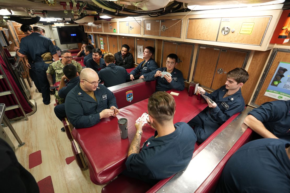 Sailors socialize on board USS Mississippi on March 29.