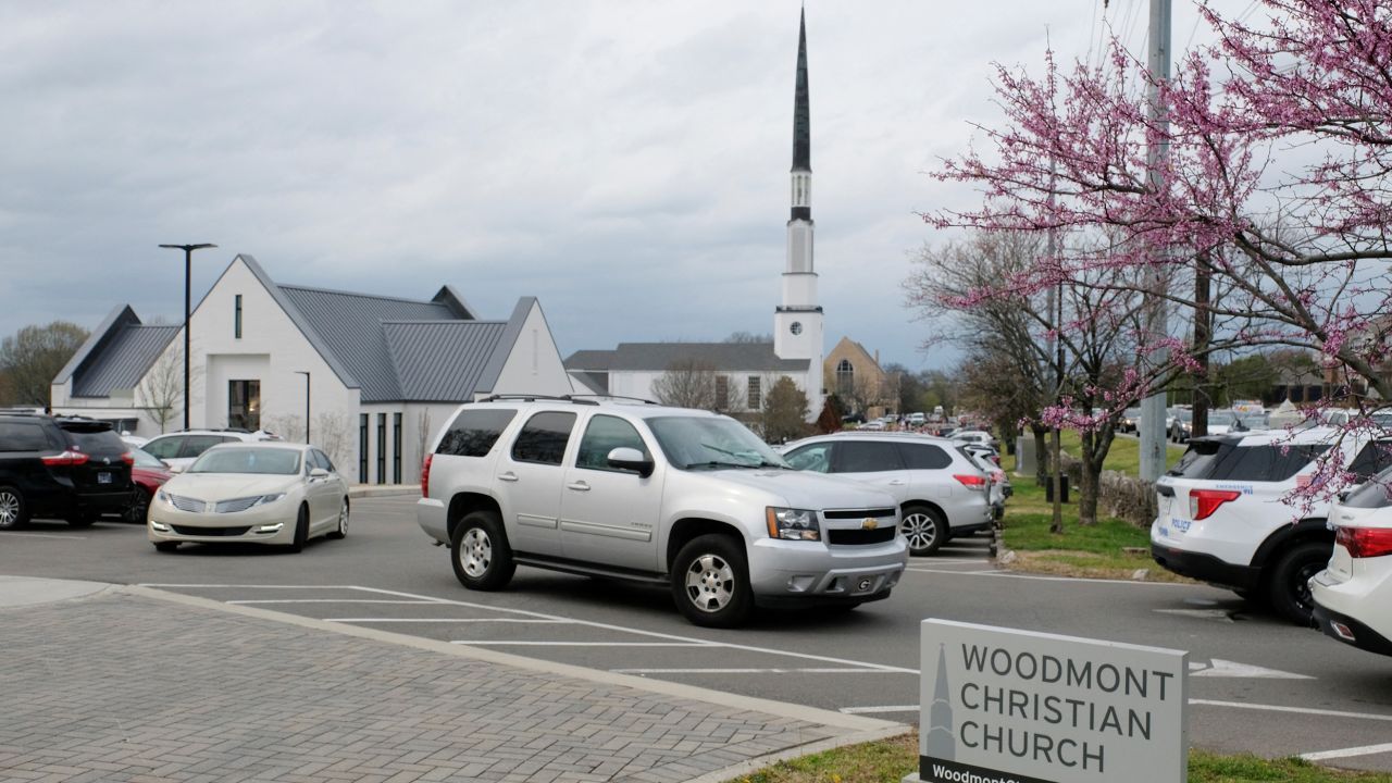 Mourners depart the funeral service of nine-year-old student Evelyn Dieckhaus who was killed in the shooting.